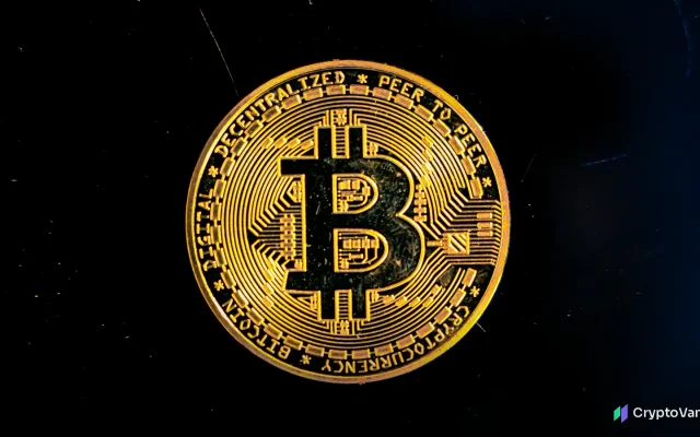 A gold bitcoin coin glowing against a dark, starry background